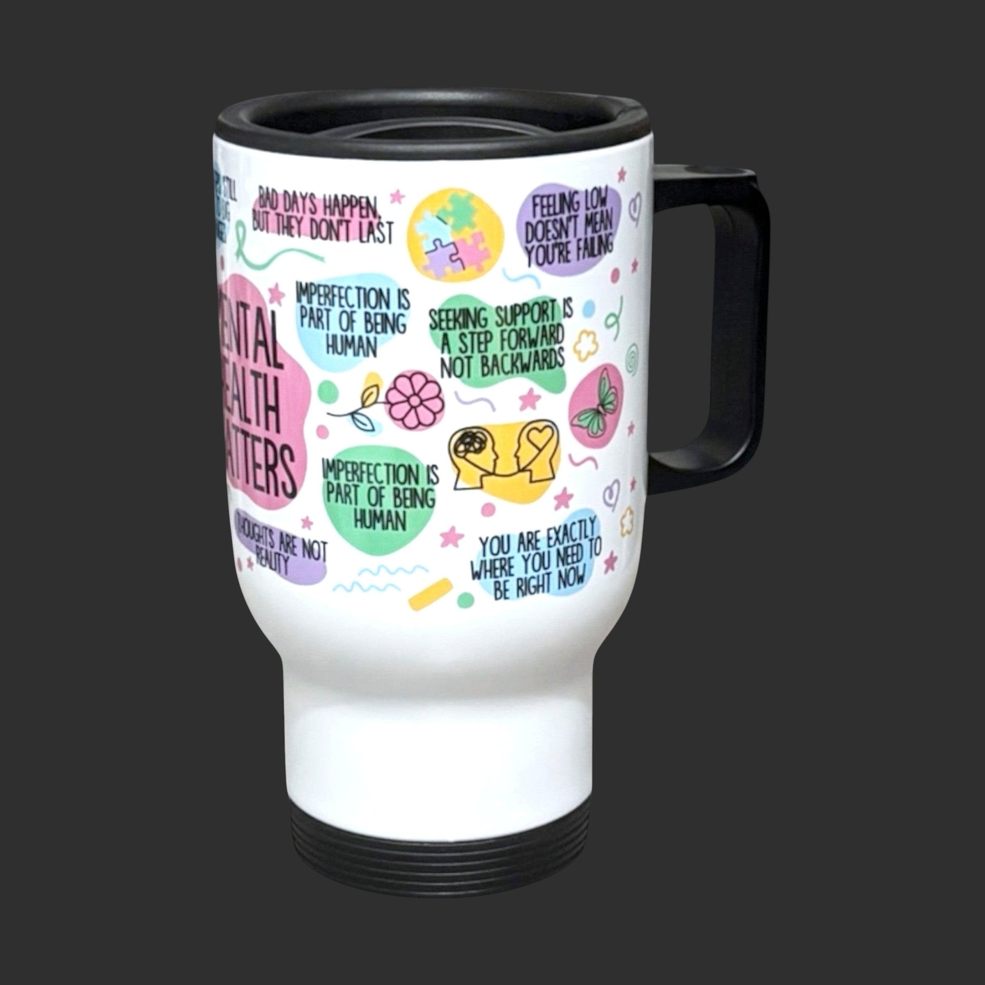 Illustrated Solutions Store mental health awareness travel mug with positive affirmations and colorful graphics. White mug with black handle and lid.