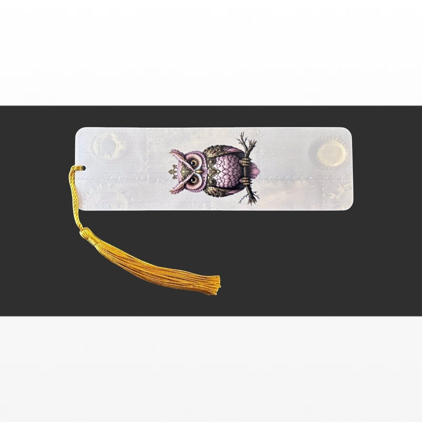 Illustrated Solutions Store pink steampunk owl aluminium bookmark with a gold tassel on a black background
