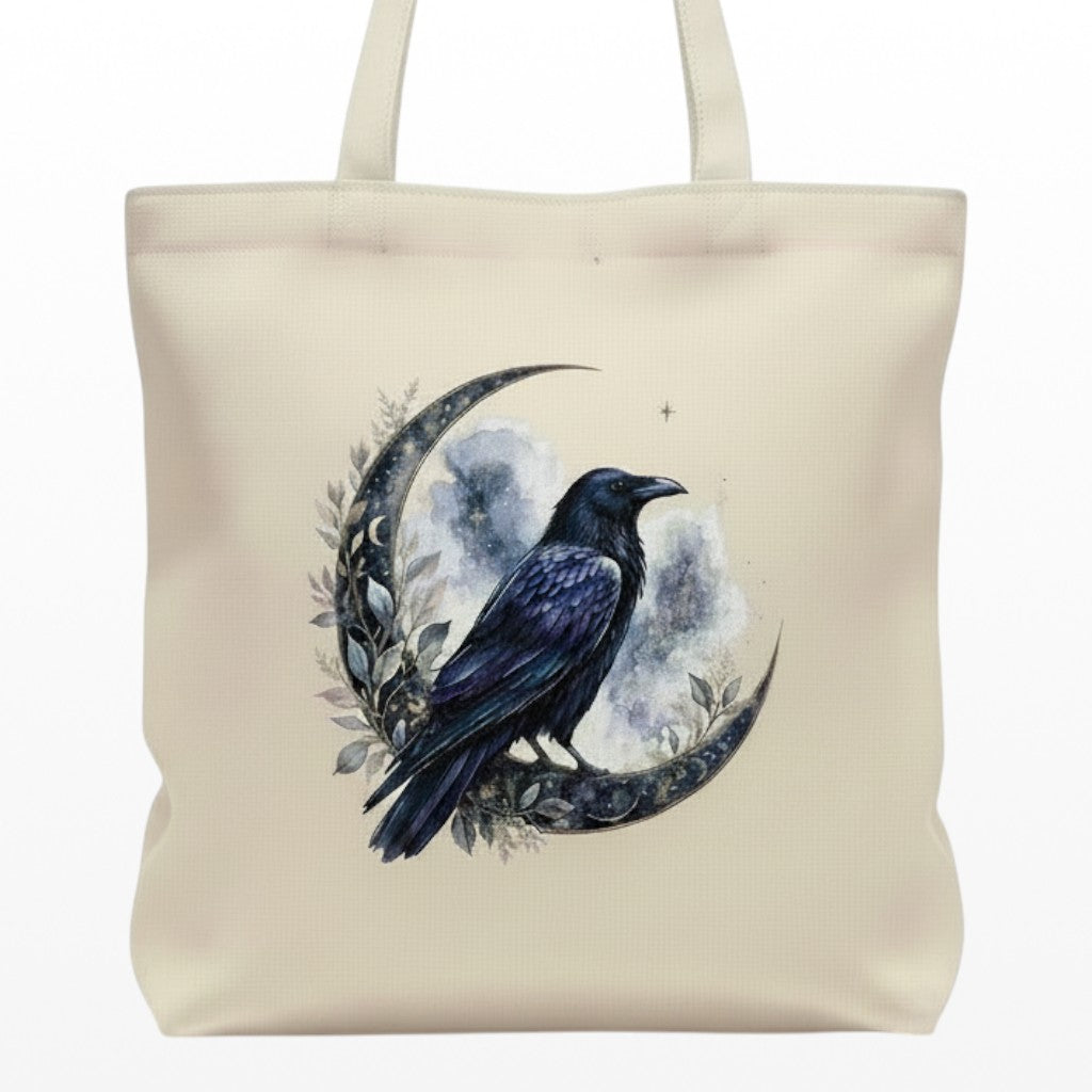Illustrated Solutions Store canvas tote bag featuring a gothic raven and crescent moon design on a natural cream fabric.
