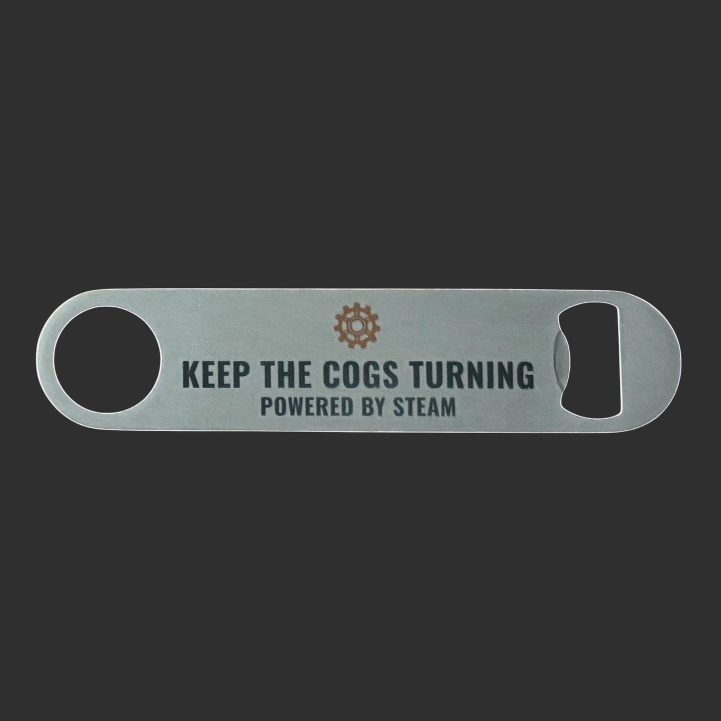 Illustrated Solutions Store steampunk bar blade bottle opener with Keep the Cogs Turning text and gear icon.