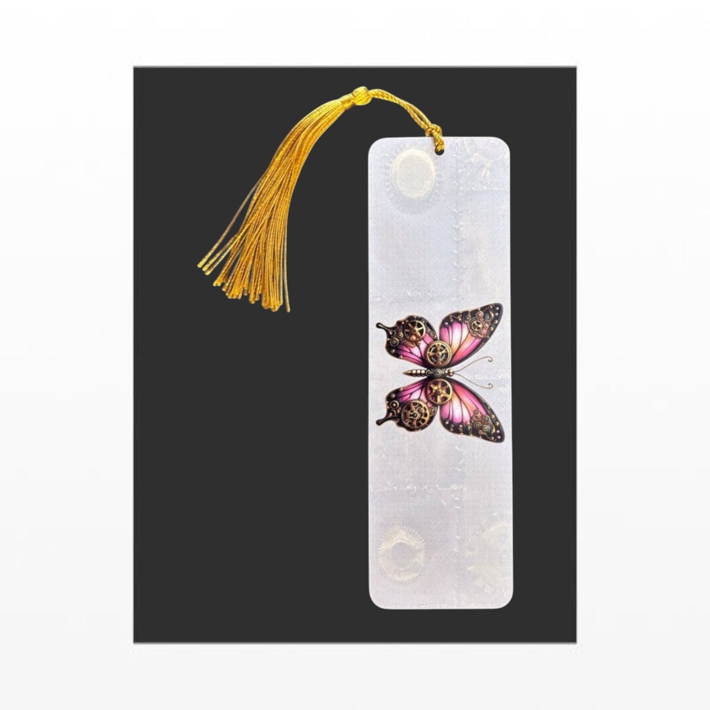 Illustrated Solutions Store aluminium bookmark featuring a pink steampunk butterfly with mechanical gear details. Vertical view