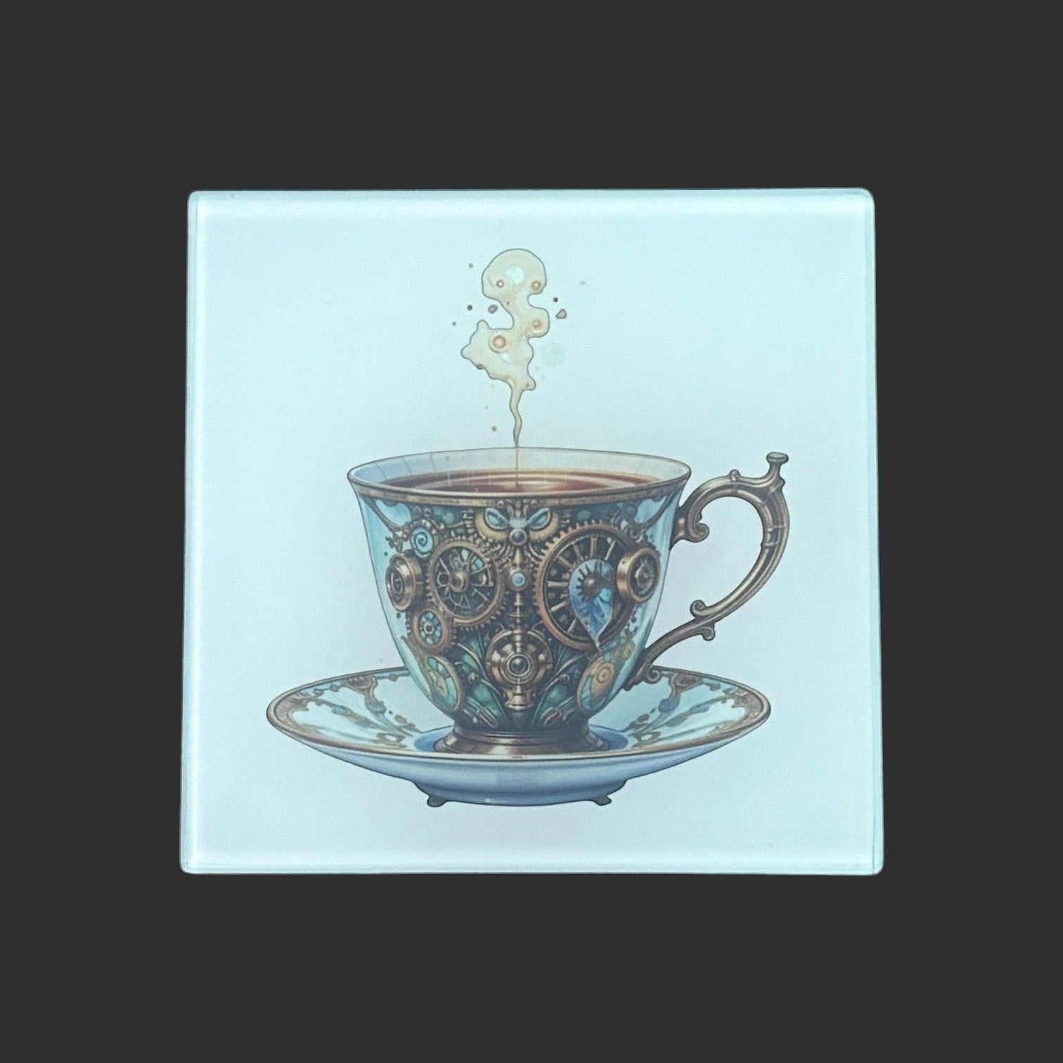 Illustrated Solutions Store steampunk glass coaster with a clockwork teacup and saucer, featuring intricate gears and ornate details.