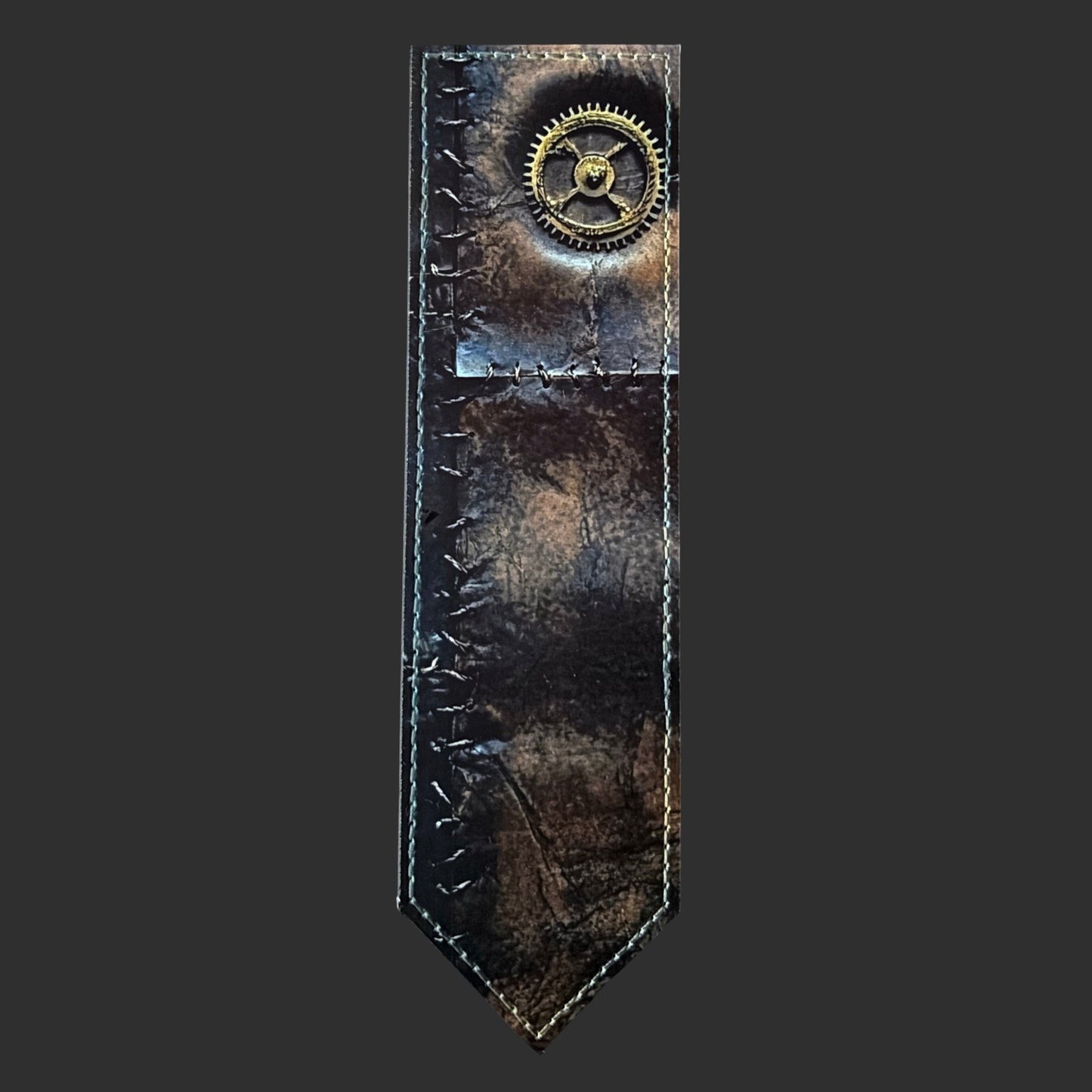 Illustrated Solutions Store steampunk leather bookmark with distressed brown finish, stitched edges, and brass gear detail