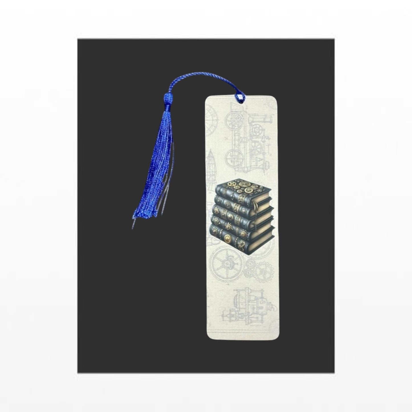 Illustrated Solutions Store steampunk metal bookmark featuring a stack of ornate books with a blue tassel.