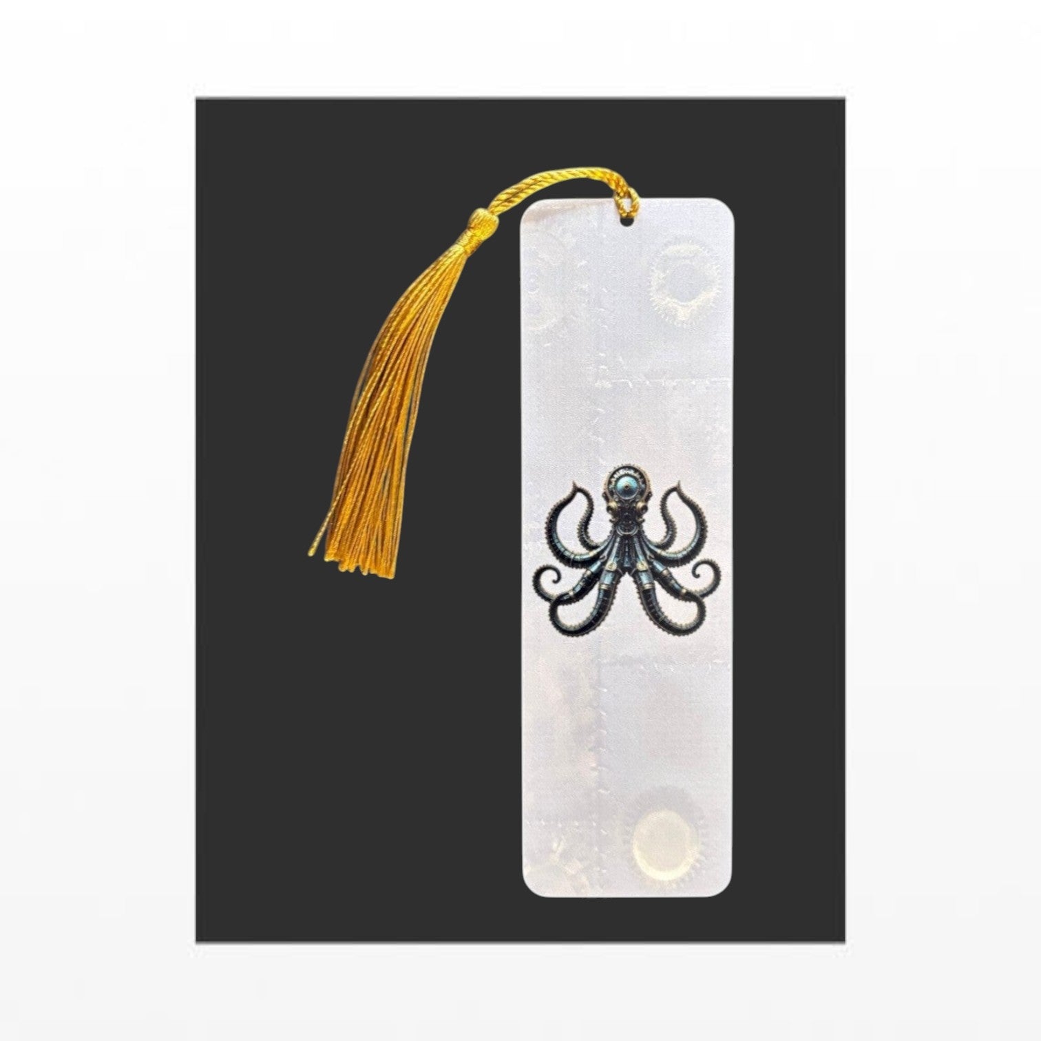 Illustrated Solutions Store steampunk octopus aluminium bookmark with a gold tassel and mechanical gear details. Vertical view.
