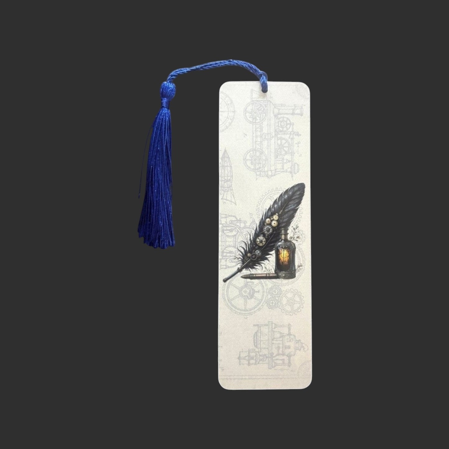 Illustrated Solutions Store steampunk metal bookmark featuring a black writing quill design with a blue tassel.