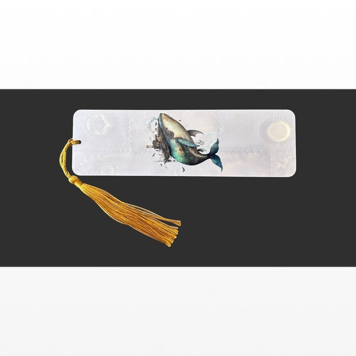 Illustrated Solutions Store steampunk whale bookmark made of aluminium with a vibrant mechanical design and gold tassel.