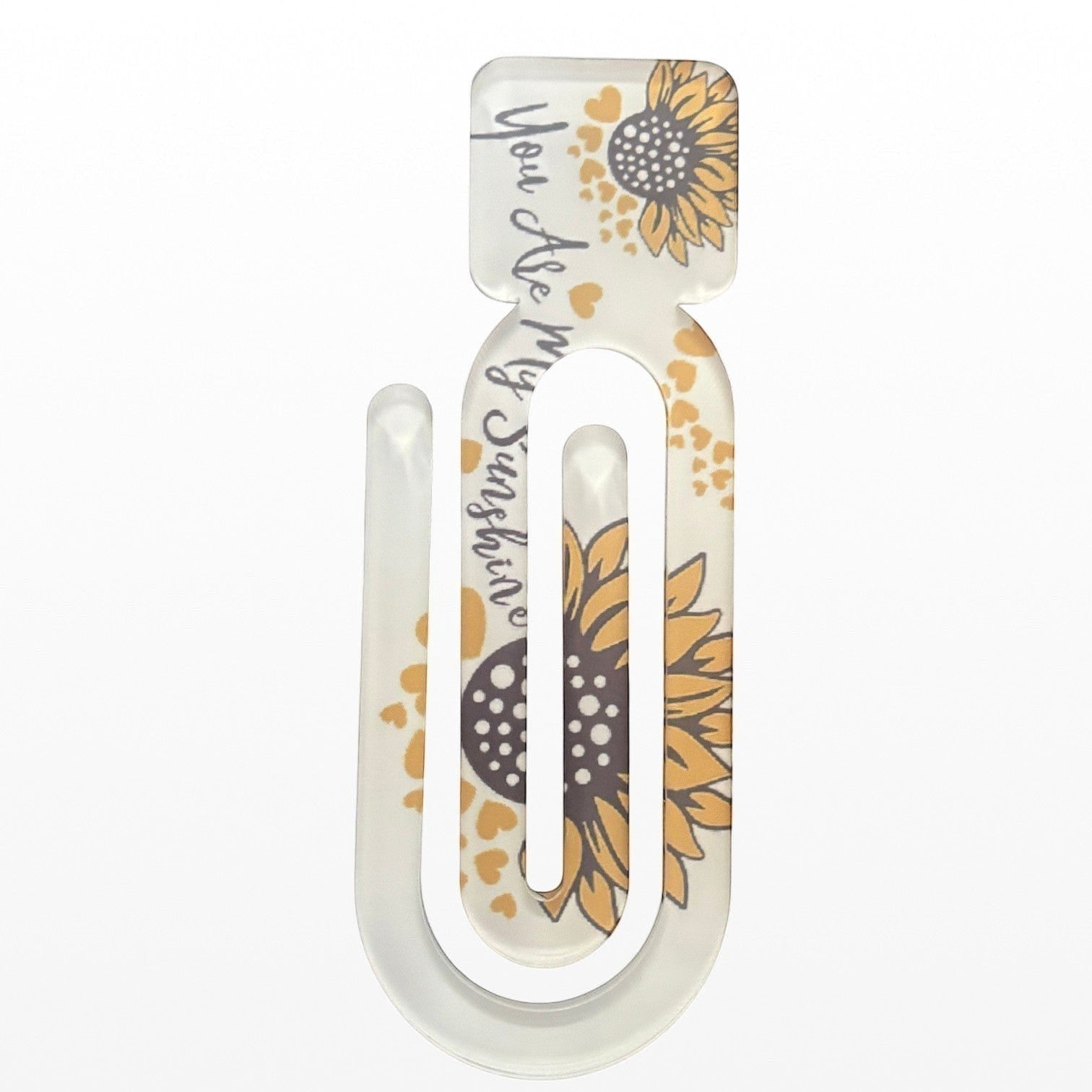 Illustrated Solutions Store acrylic book clip with sunflower print and You Are My Sunshine text on a white background