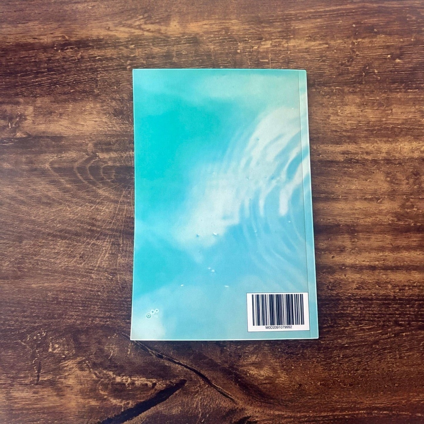 Illustrated Solutions Store wellbeing journal with a calming blue water ripple design. Ideal for mindfulness and mental health reflection.
