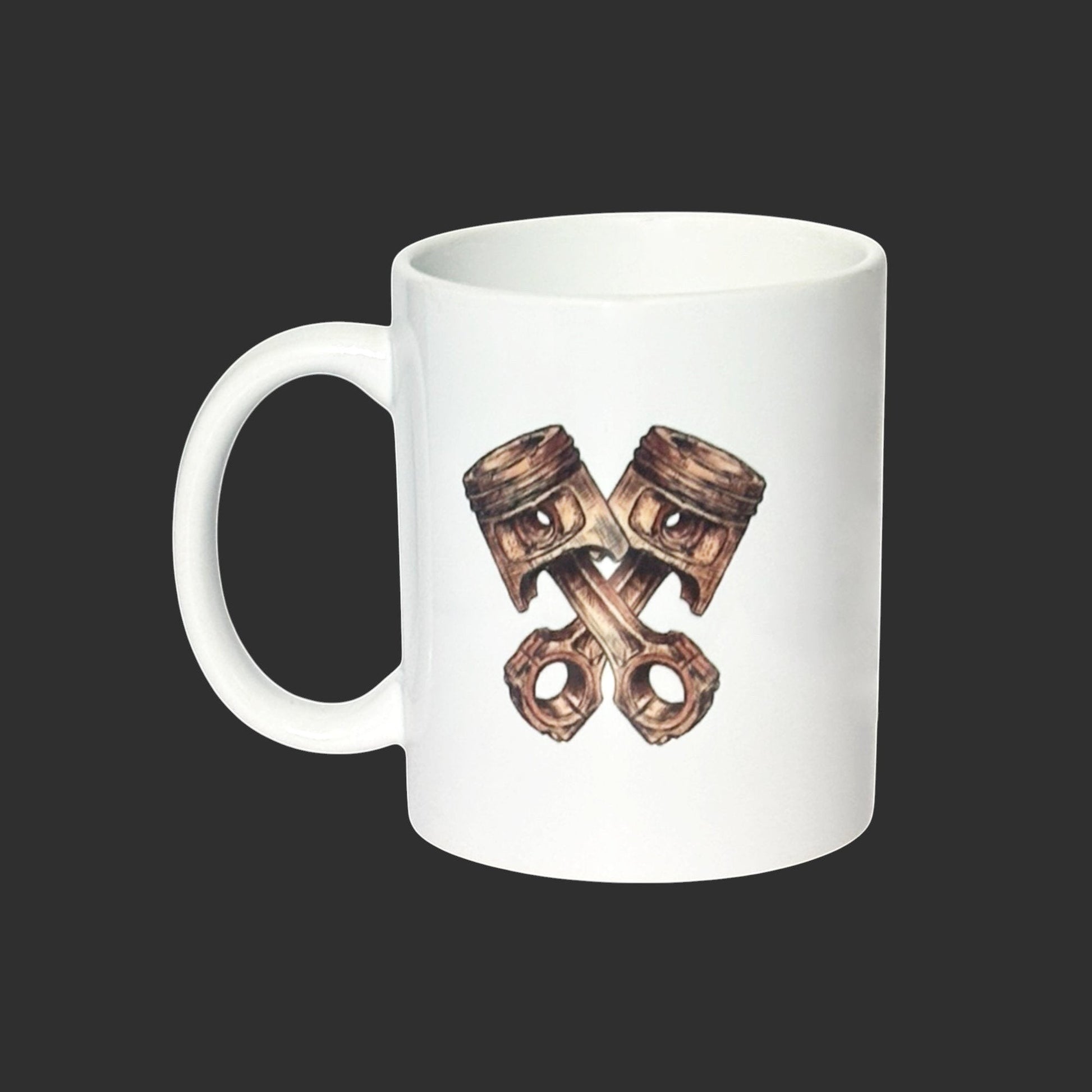 Illustrated Solutions Store white ceramic mug with crossed pistons design, perfect for car enthusiasts.