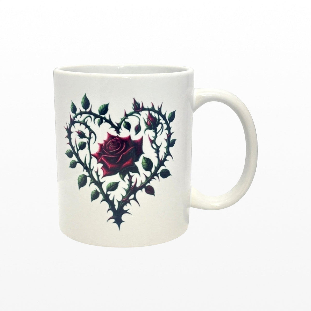 White mug with a heart-shaped design featuring a rose on a white background