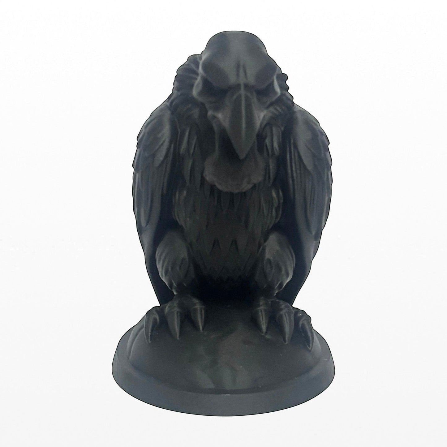 Illustrated Solutions Store gothic black vulture figurine with detailed feathers and talons, displayed on a base.