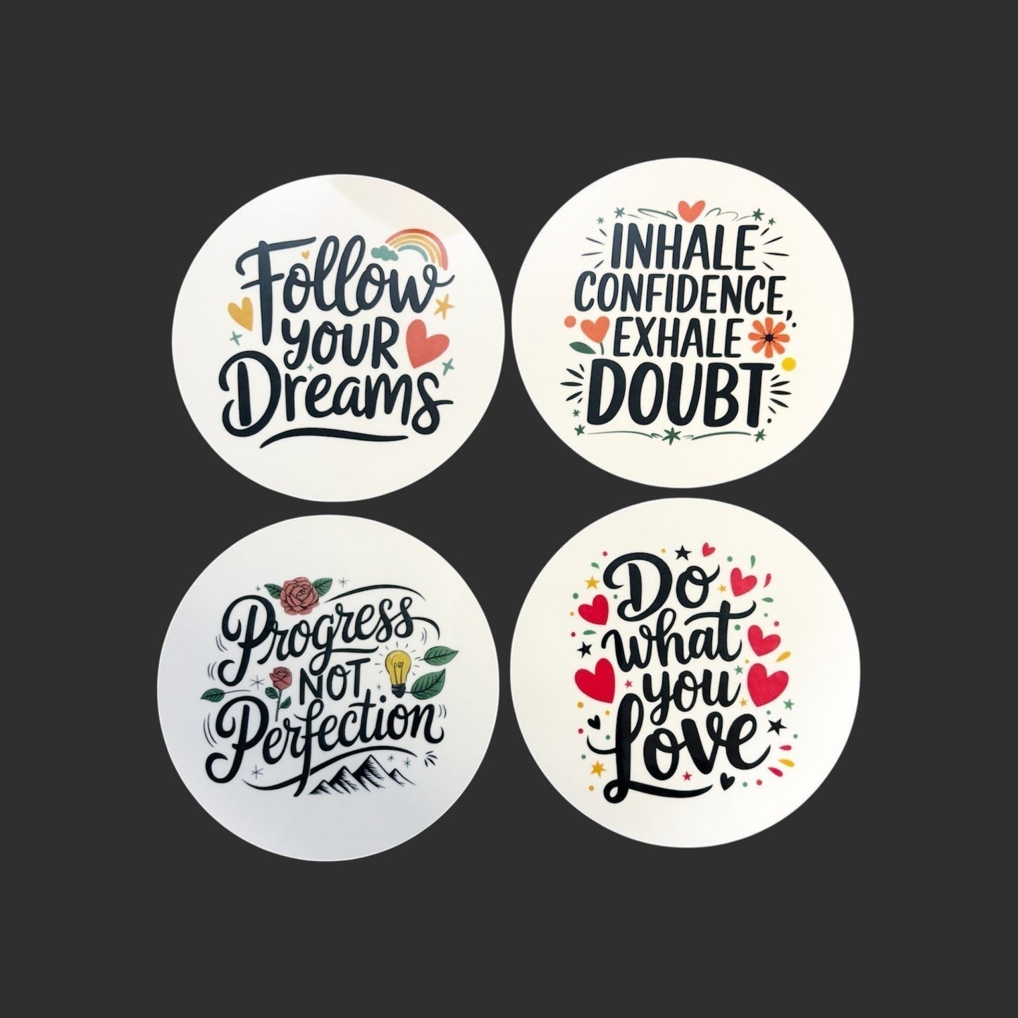 Illustrated Solutions Store motivational round MDF coasters with uplifting quotes like "Follow Your Dreams" and "Do What You Love."