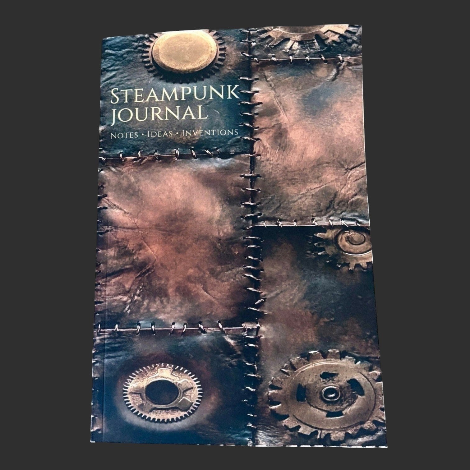 Illustrated Solutions Store steampunk journal with vintage leather and gear design, ideal for notes, ideas, and inventions.