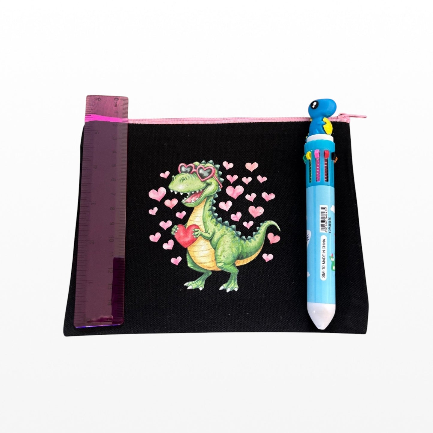 Black pouch with a dinosaur illustration, pink ruler, and blue pen on a white background, love hearts dino.