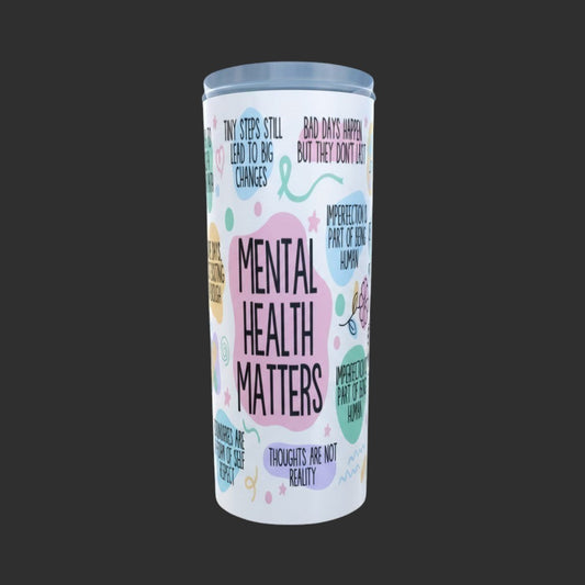 Tumbler with motivational phrases about mental health on a white background