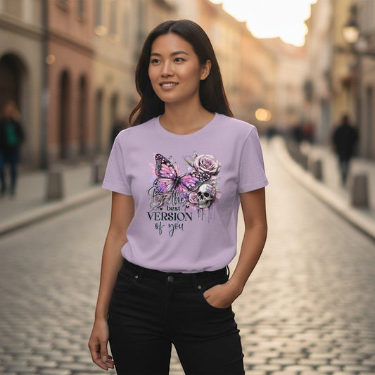 Woman wearing a lilac t-shirt with a colorful butterfly design on a street.